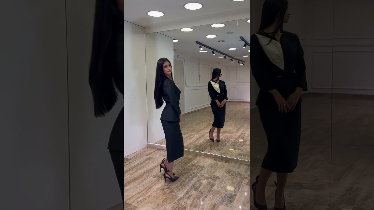 Crno bela elegantna midi haljina sa pojasom i peplumom