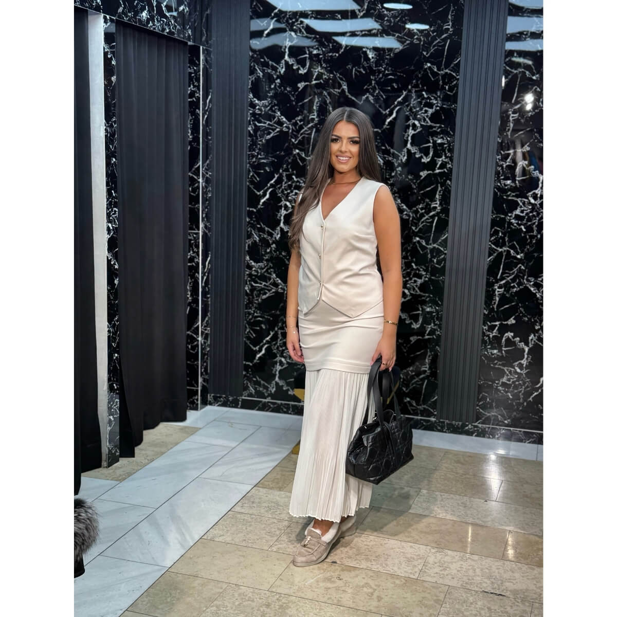 Elegantni komplet sa prslukom i plisiranom suknjom