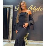 Ekskluzivna crna večernja haljina sa korset gornjim delom i raskošnim volanima