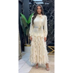 Elegantna Pastelno Žuta Maksi Haljina sa Karnerima i Mašnom